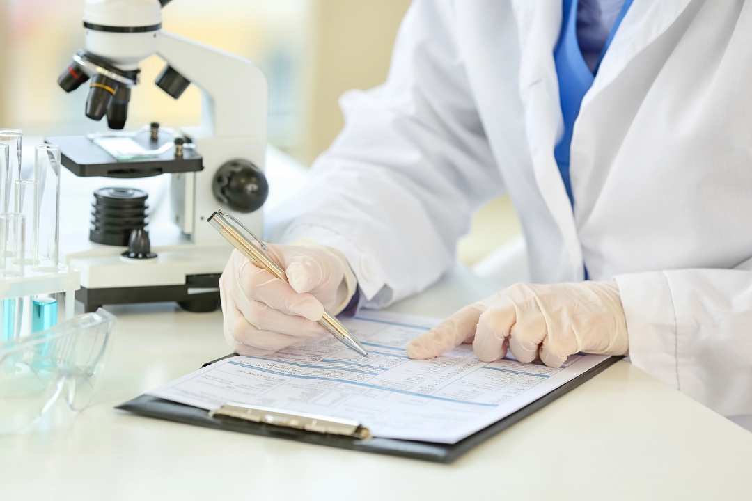 Medical professional reviewing lab data—get tested with precision and care at a certified STD Clinic near you