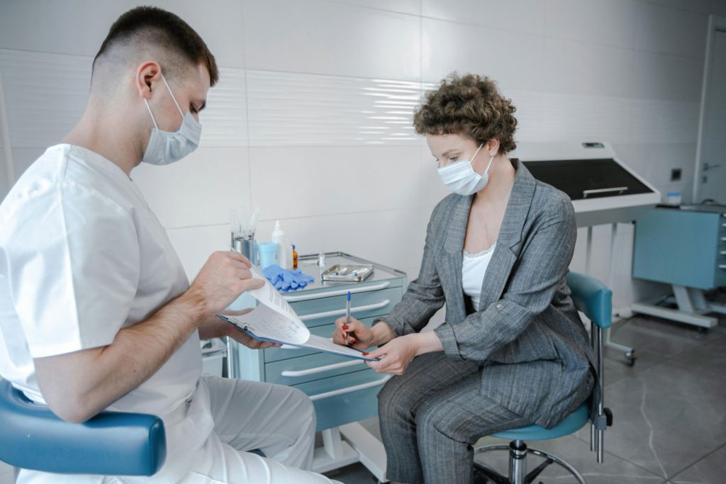 Completing quick registration for immediate Walk In STD Testing Houston.